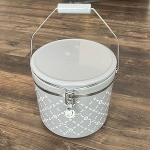 Pet accessories container holds food, toys, treats etc.